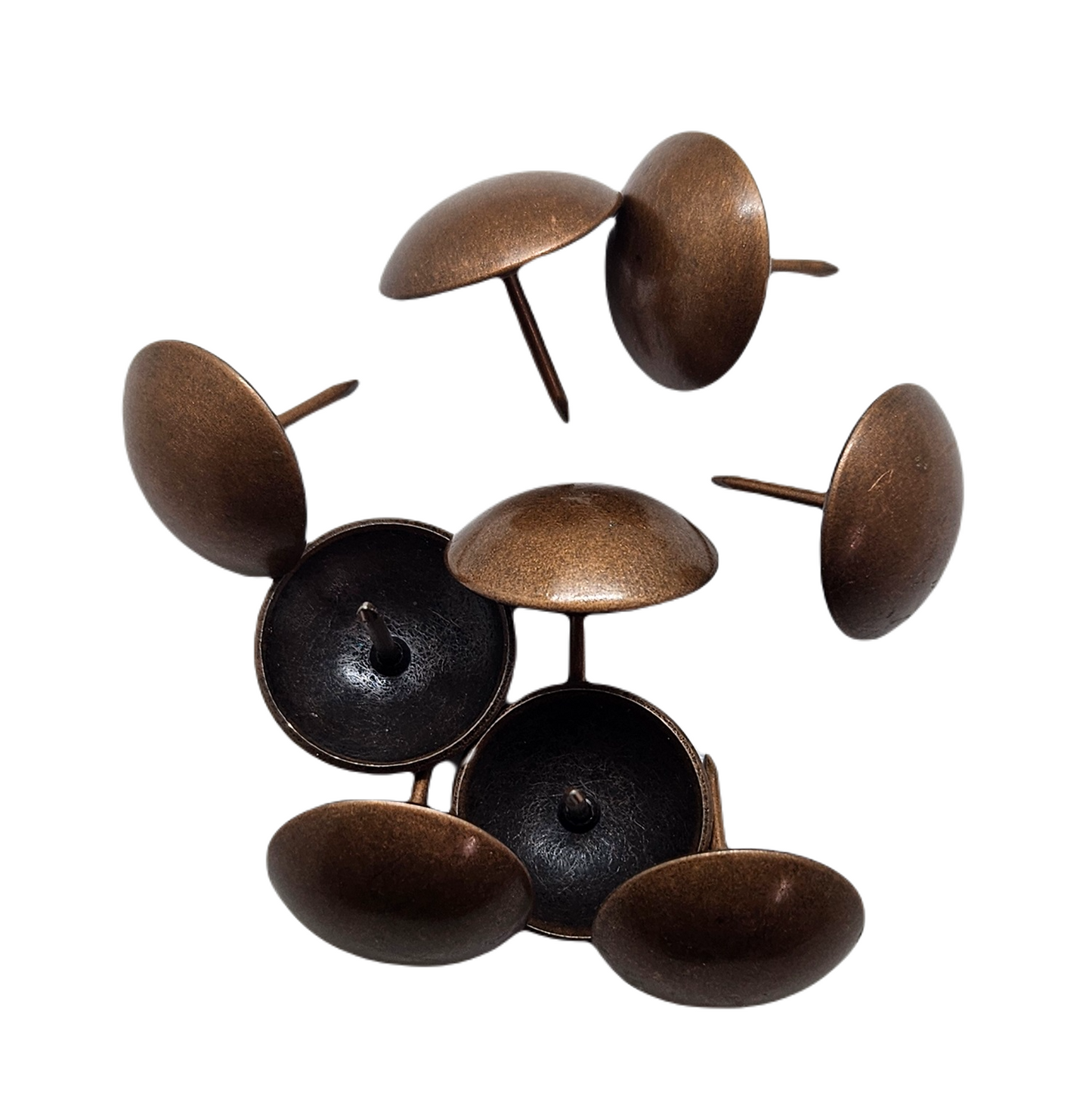 Bronze upholstery tacks with round domed heads for furniture decoration.