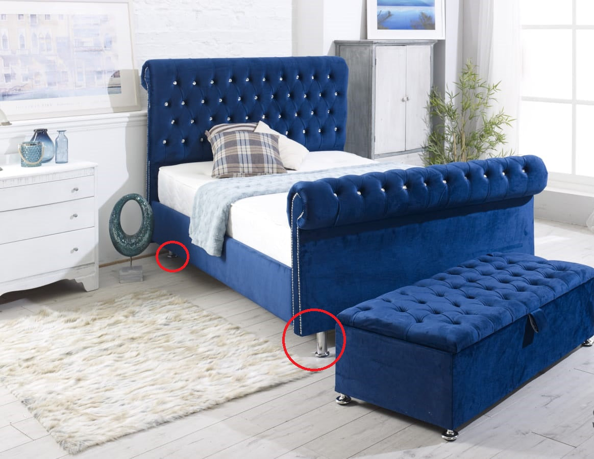 Chrome cylindrical furniture foot with flat mounting plate and screw holes.