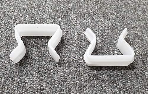Plastic U-clips used for securing and fastening furniture components.