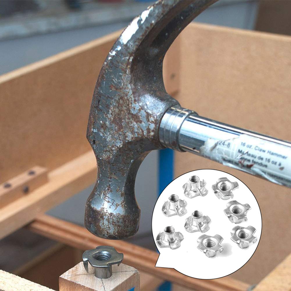 Metal T-nut with four prongs for secure bolt fastening in wood or furniture.