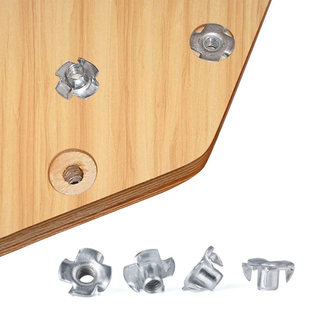Pronged metal T-nuts used for fastening bolts into wooden furniture.